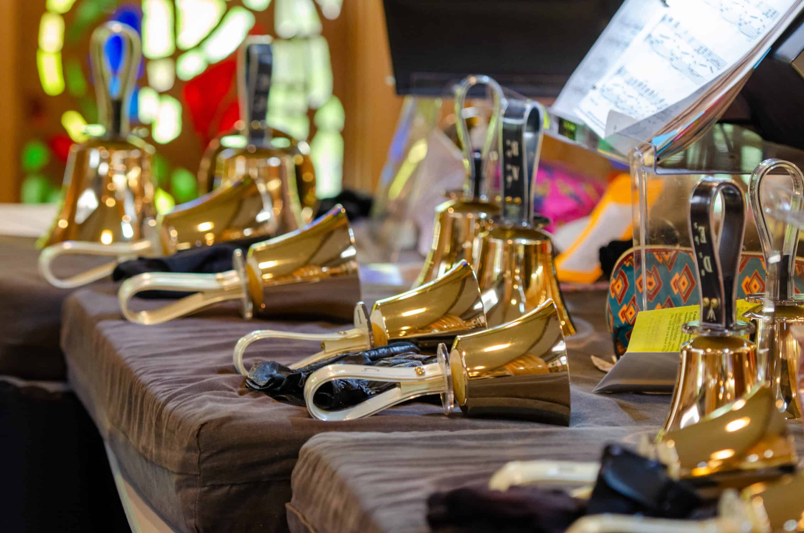 Church bells displayed on a table at The Episcopal Church of the Good Samaritan.