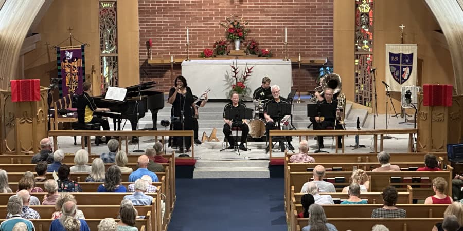 Altar and choir performing during church service.