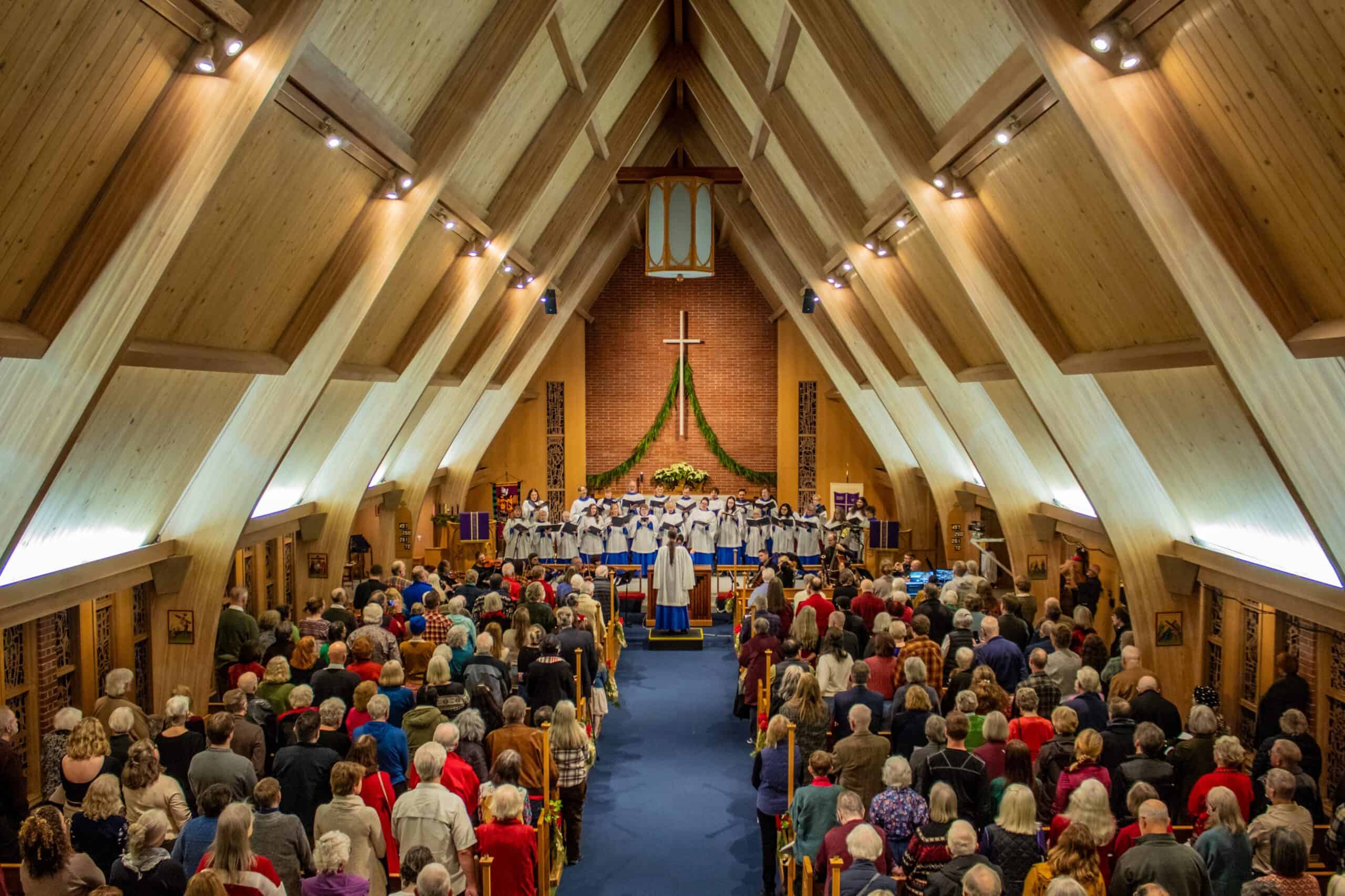 Interior of The Episcopal Church of the Good Samaritan during service with congregation.